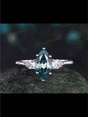 G10k white Gold Marquise
Cut emerald Green
Sapphire Ring
Engagement Ring,